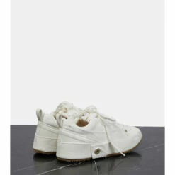 Loewe Distressed Denim Sneakers